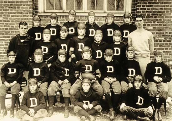 John F. Kennedy (seated, front row, far right) photographed with the Dexter School football team.
