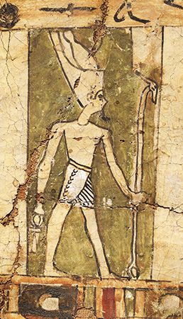 Atum wearing the double crown, depicted on a fragment of cartonnage, Egypt, Ptolemaic Period-Roman Period, 200 BC-200 AD; in the Metropolitan Museum of Art, New York. Egyptian god diety. See Notes